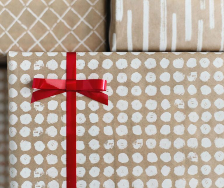 brown & white wrapping paper with red bow